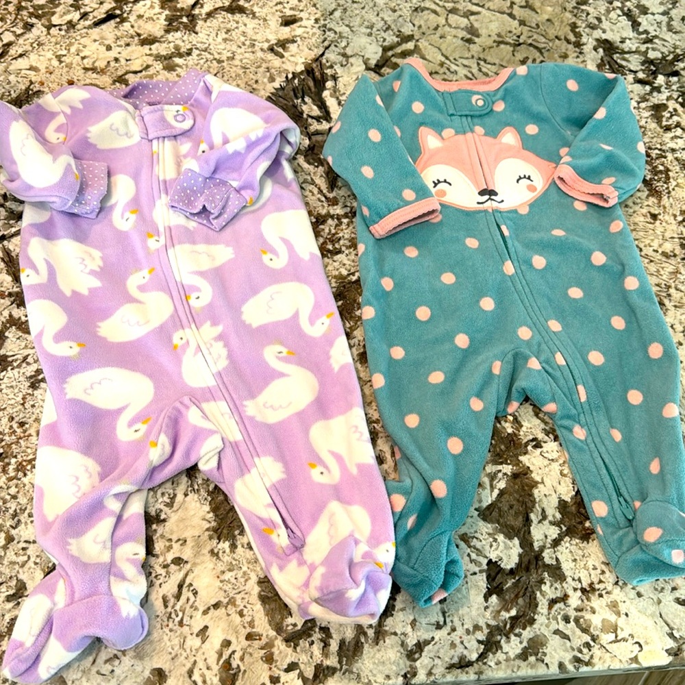 Carter’s Pair of fleece footie PJs